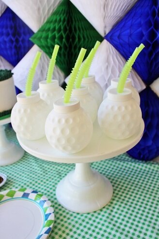 golf ball sippy cups at a golf birthday party